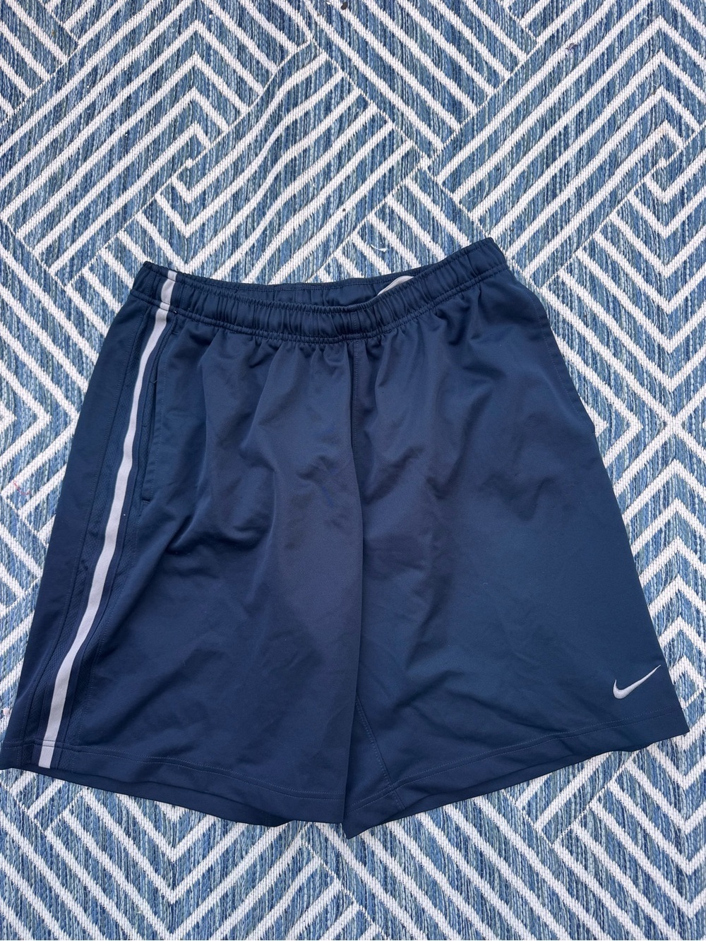 Nike Men's Navy Athletic Shorts with White Side Stripe and Swoosh